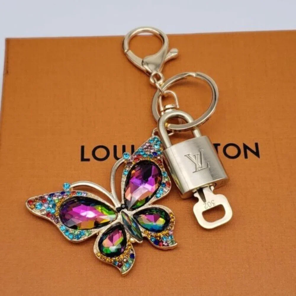 Authentic Louis Vuitton Gold Lock & Box w/ Unbranded Butterfly Bagcharm 122725